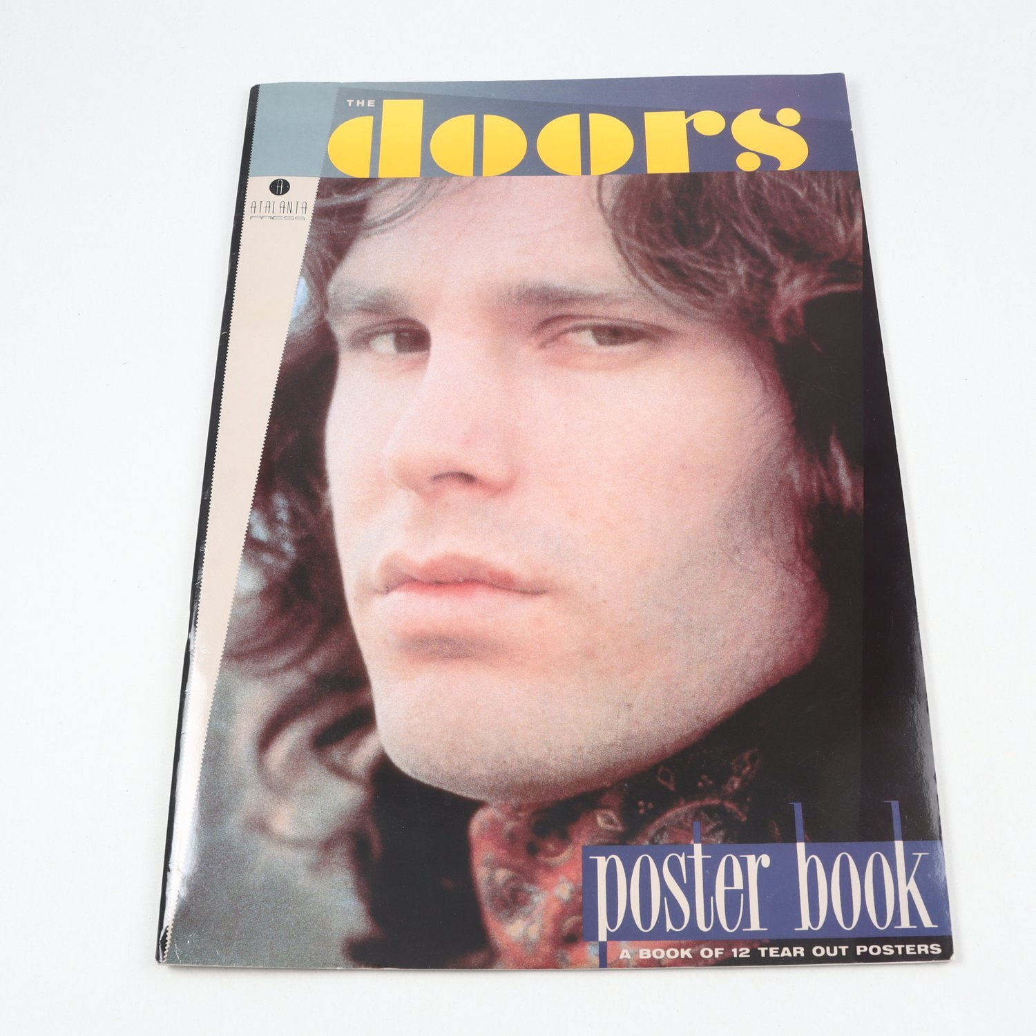 The Doors poster book, A book of 12 tear out posters.