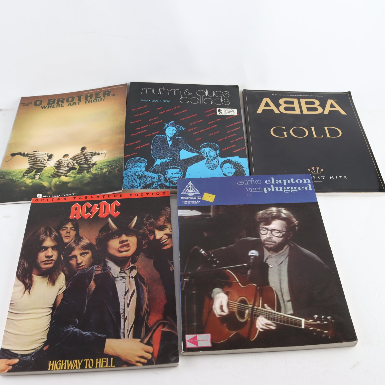 Blandade kataloger med noter, Abba, AC/DC, Eric Clapton, m.m