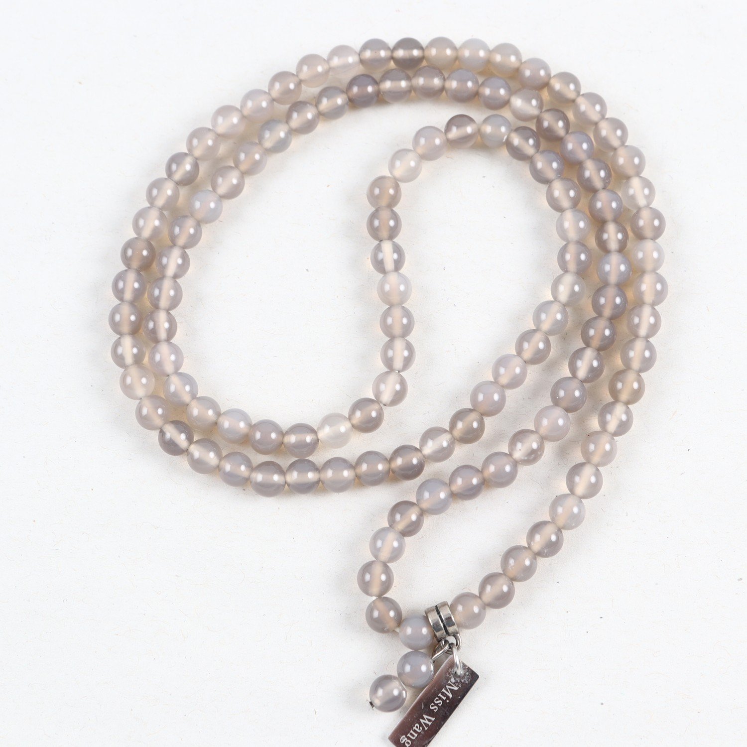 Halsband, Miss Wang