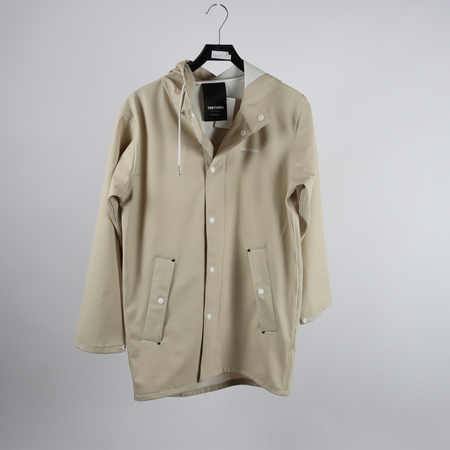 Regnjacka, Tretorn, beige, stl. XXS. Fläckig framsida.