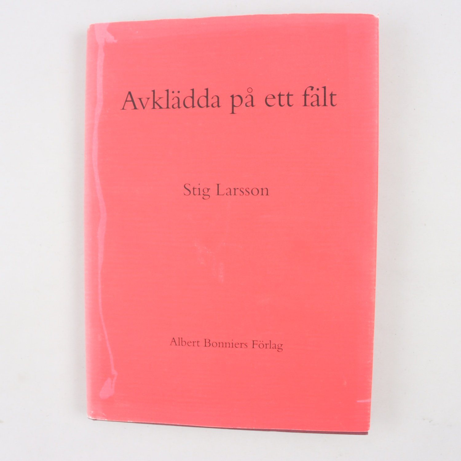 Stig Larsson, Avklädda på ett fält
