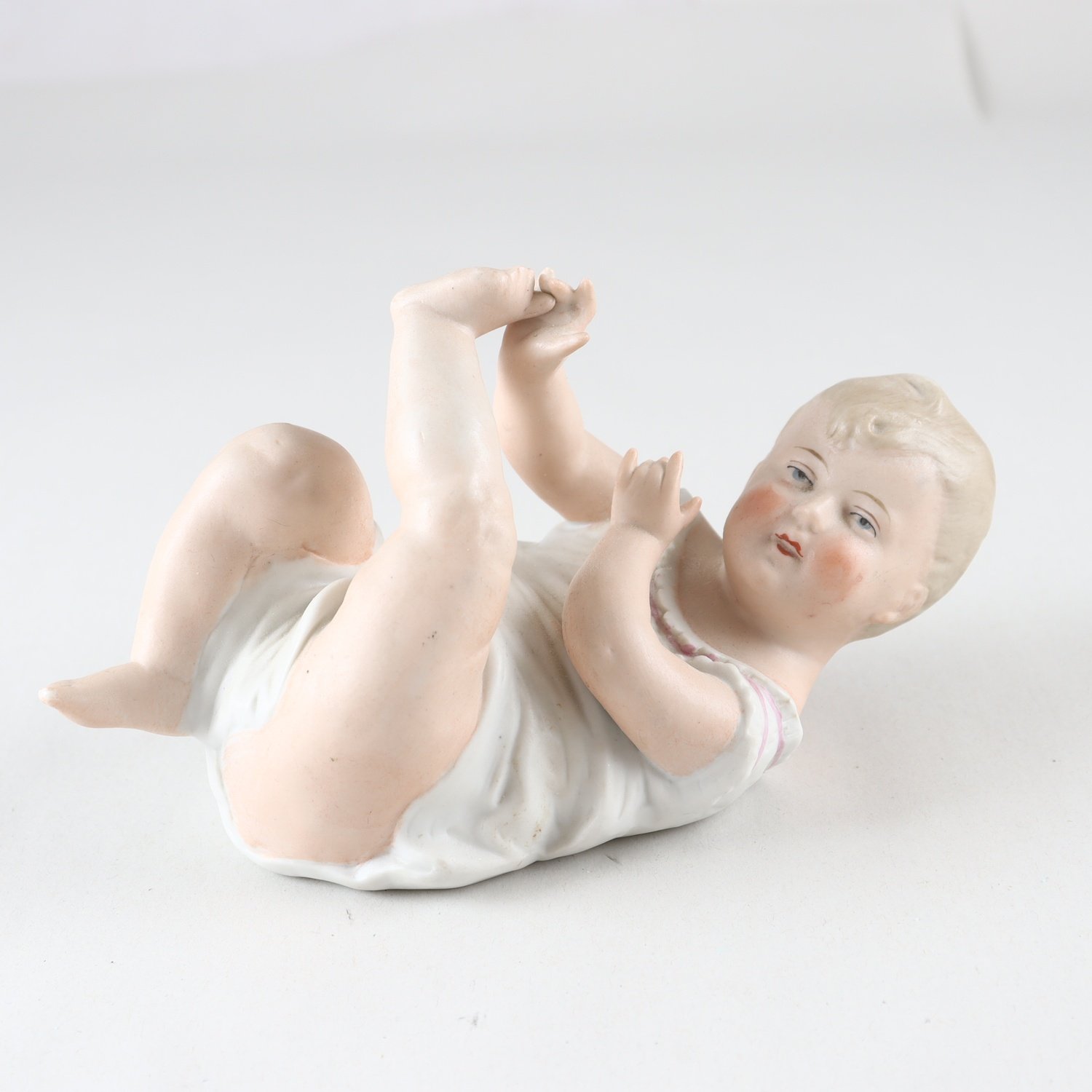 Figurin, porslin, Gerbruder Heubach, Tyskland. Samfraktas ej
