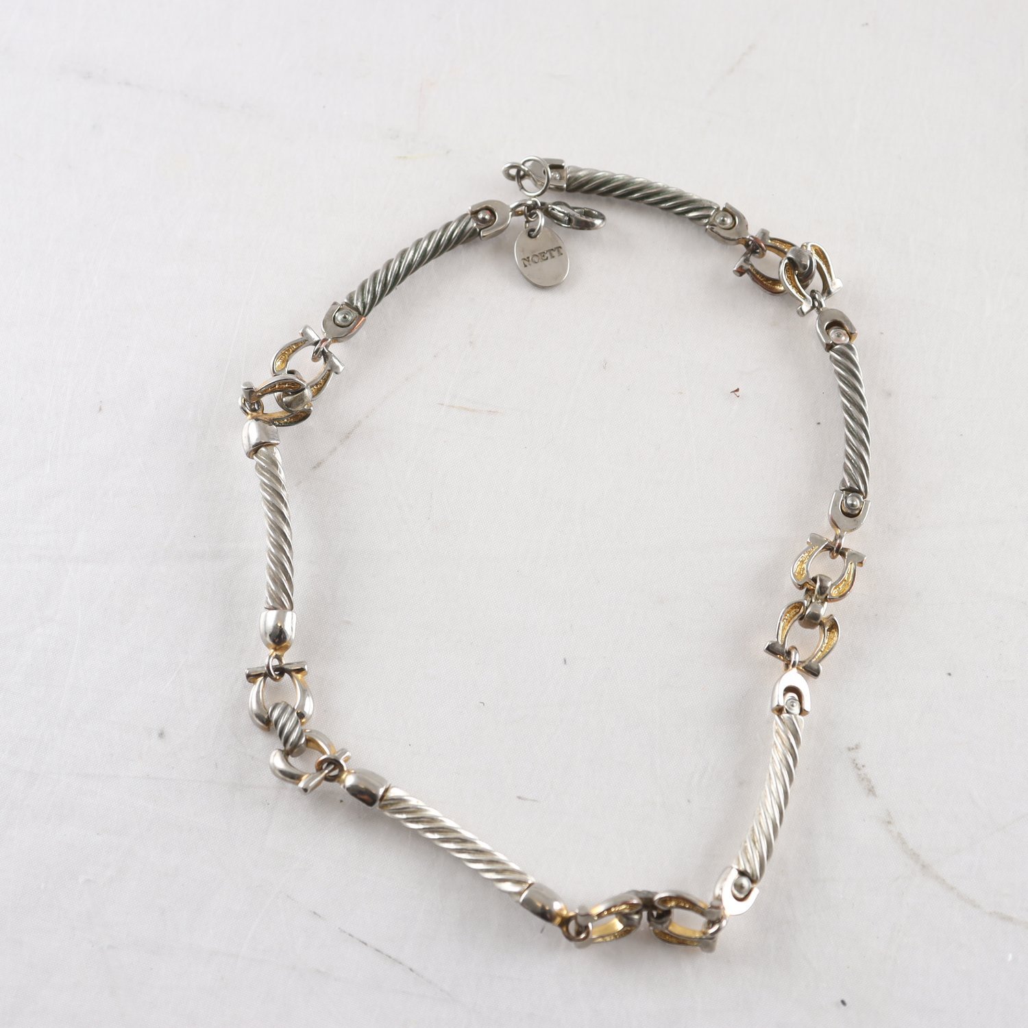 Halsband, Noett, vintage, vit och gul metall.