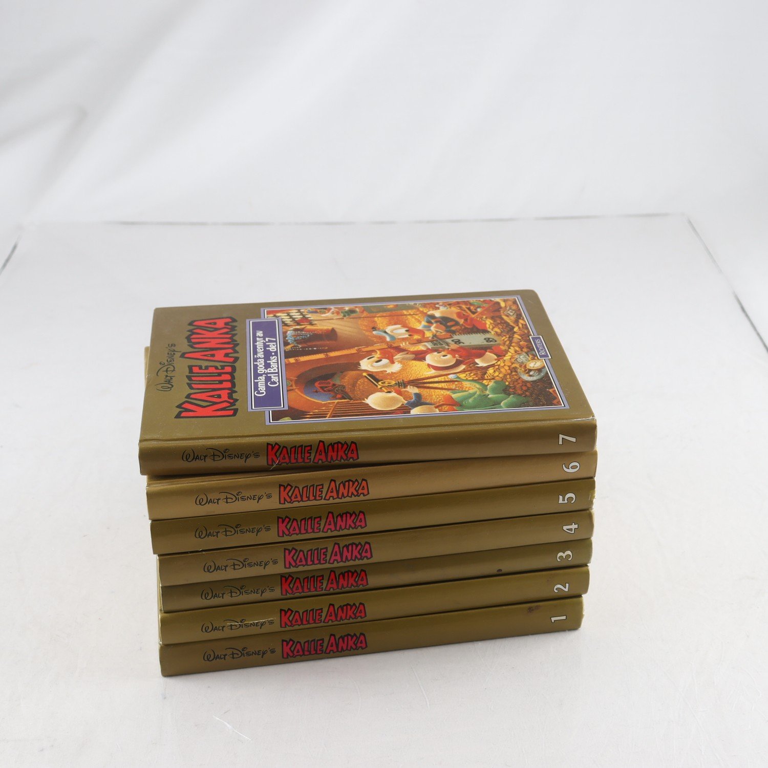 Kalle Anka, gamla goda äventyr av Carl Barks del 1-7. Samfraktas ej.