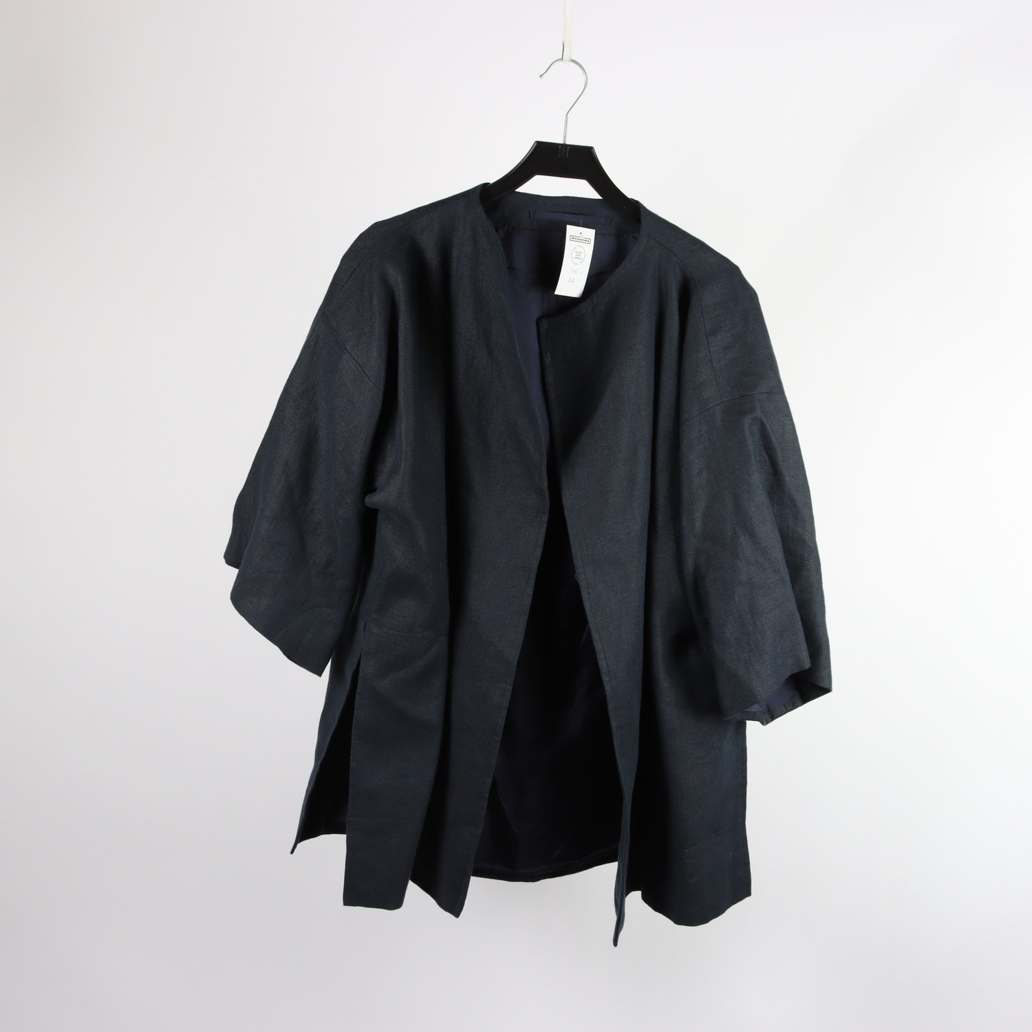 Jacka med slitsar, okänd, mörkblå, stl. ca L/XL
