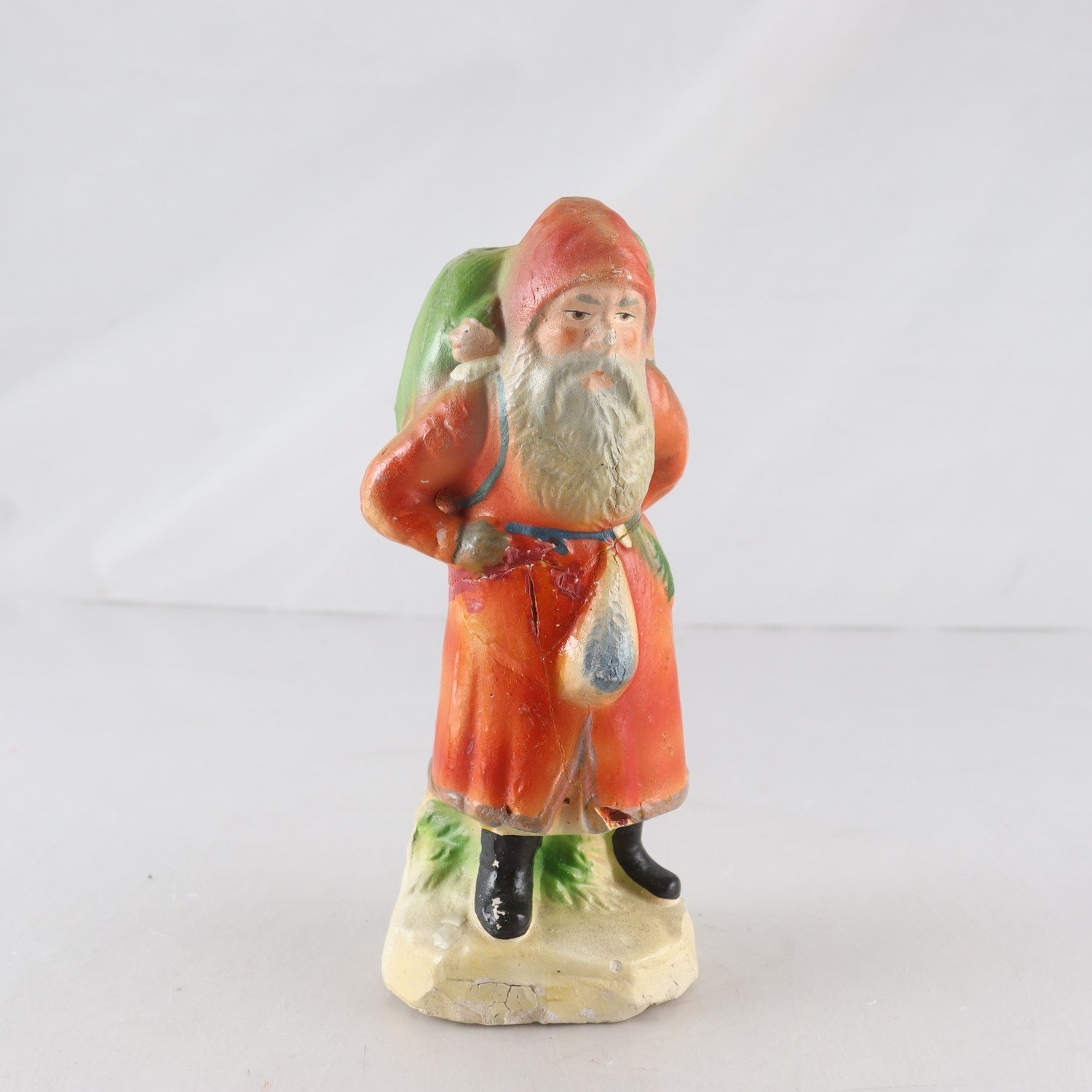 Figurin, tomte, bemålad gips, tidigt 1900-tal