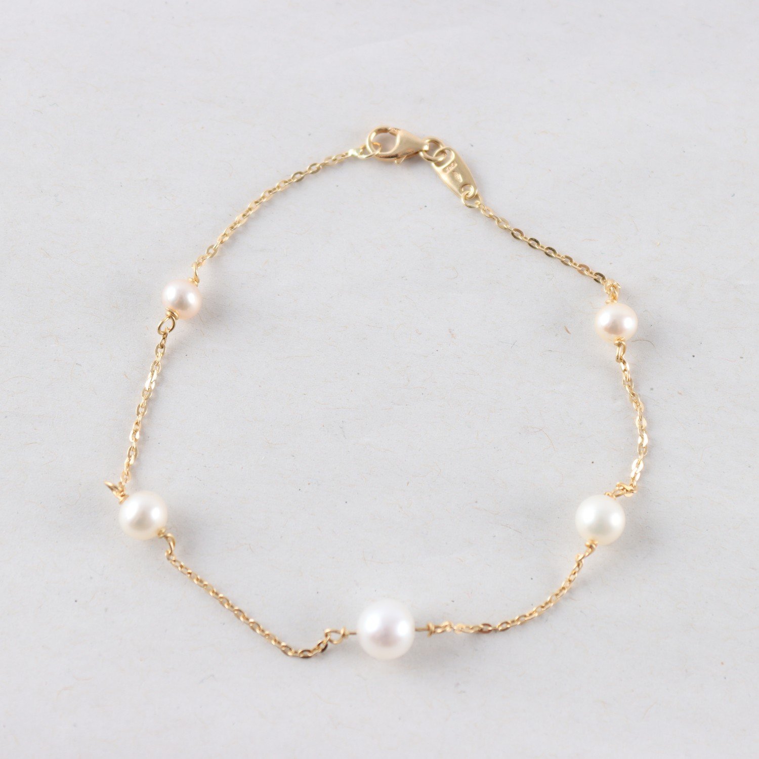 Armband, guld 18k, odlade pärlor, brv: 2,1g