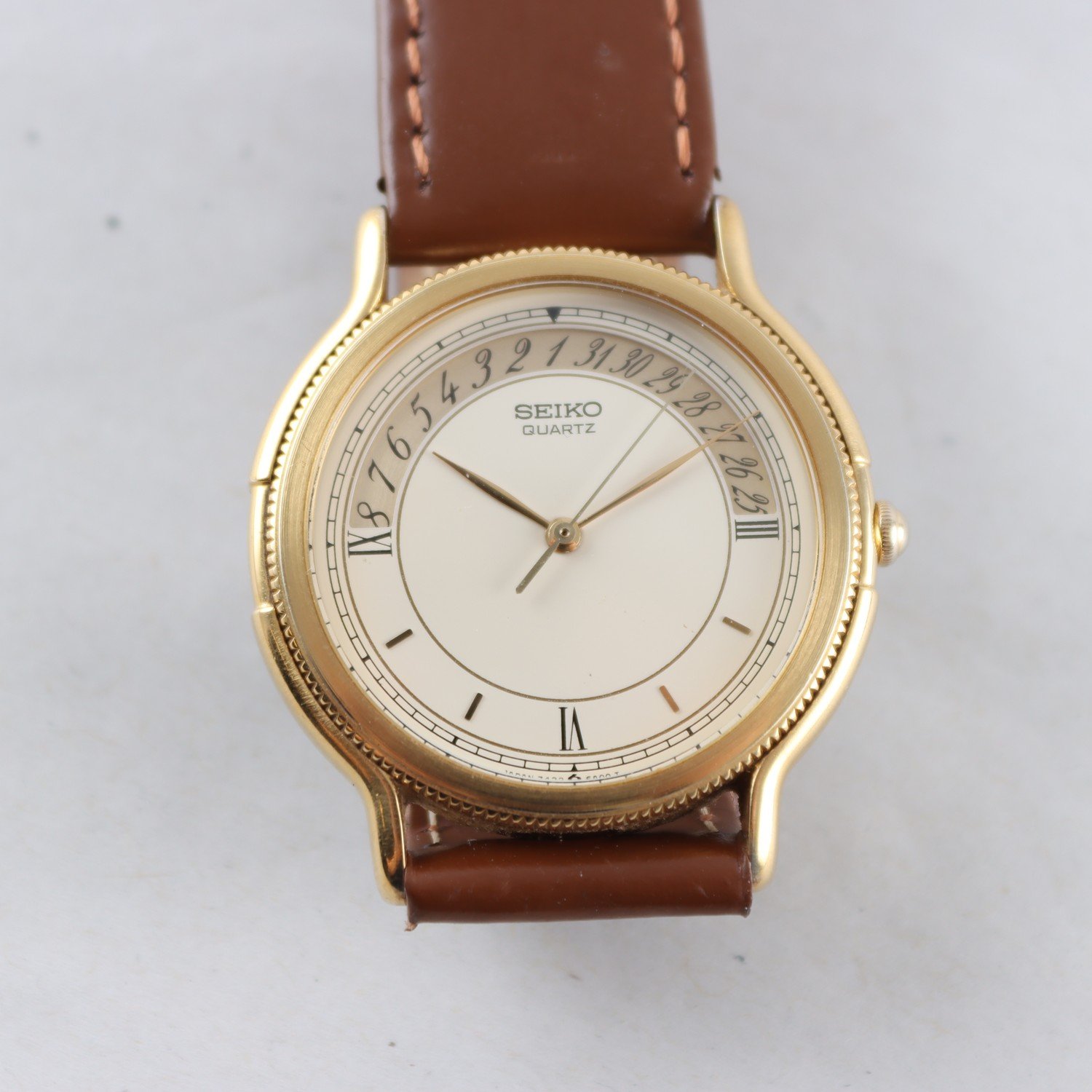 Armbandsur, förgyllt stål, Seiko Chariot Calendar, quartz