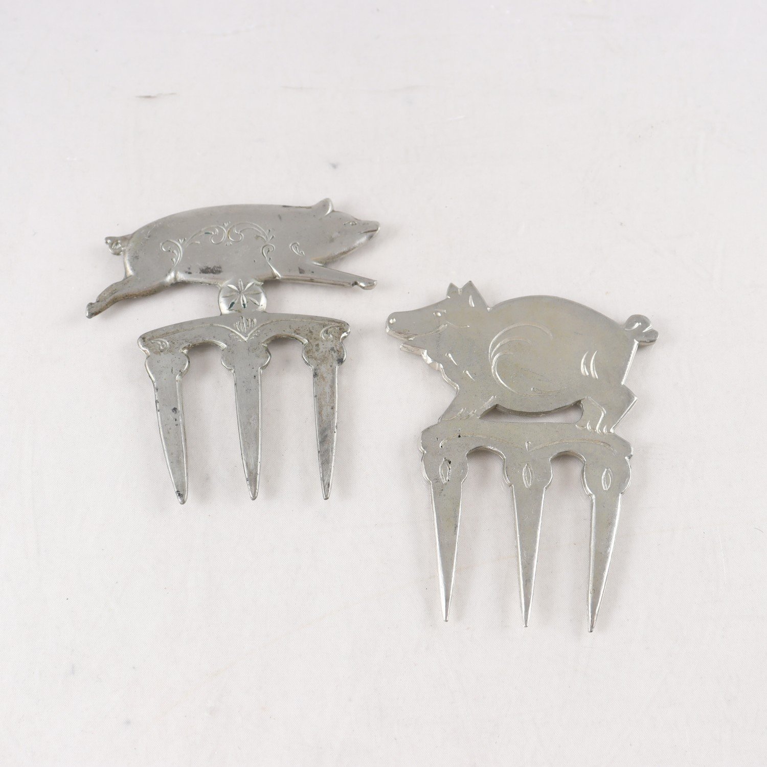 Skinkgafflar, tenn, Bockens tenn, samt Tewi, 2 st