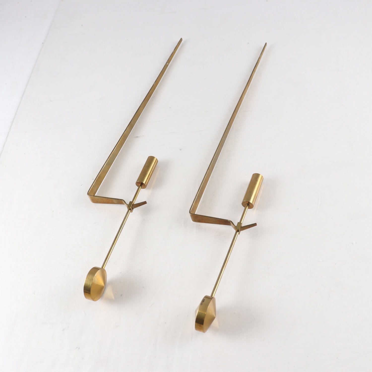 Väggljusstakar, mässing, ”Pendel”, Pierre Forssell, Skultuna, 2 st