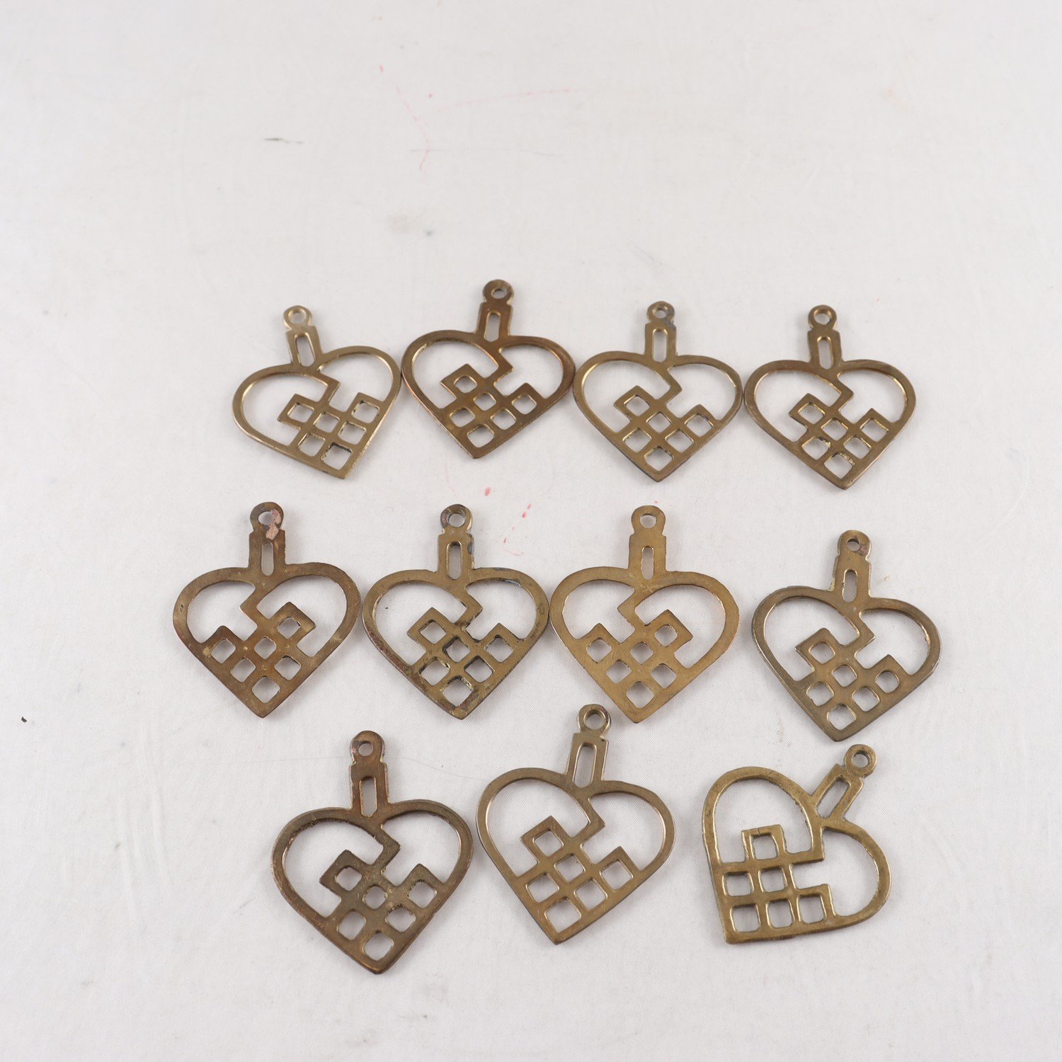 Hängen, mässing, Firma Svenskt Tenn, 11 st