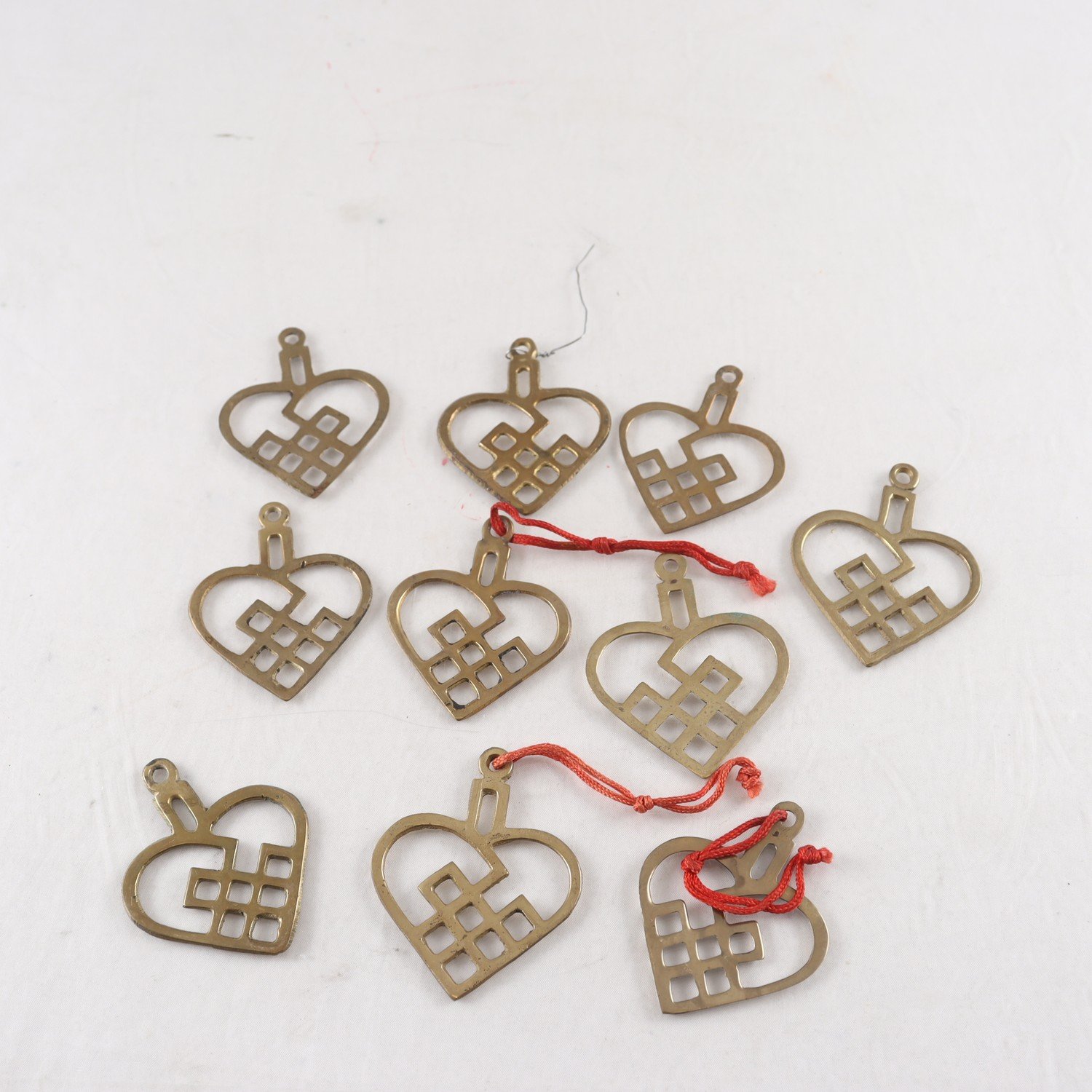 Hängen, mässing, Firma Svenskt Tenn, 10 st