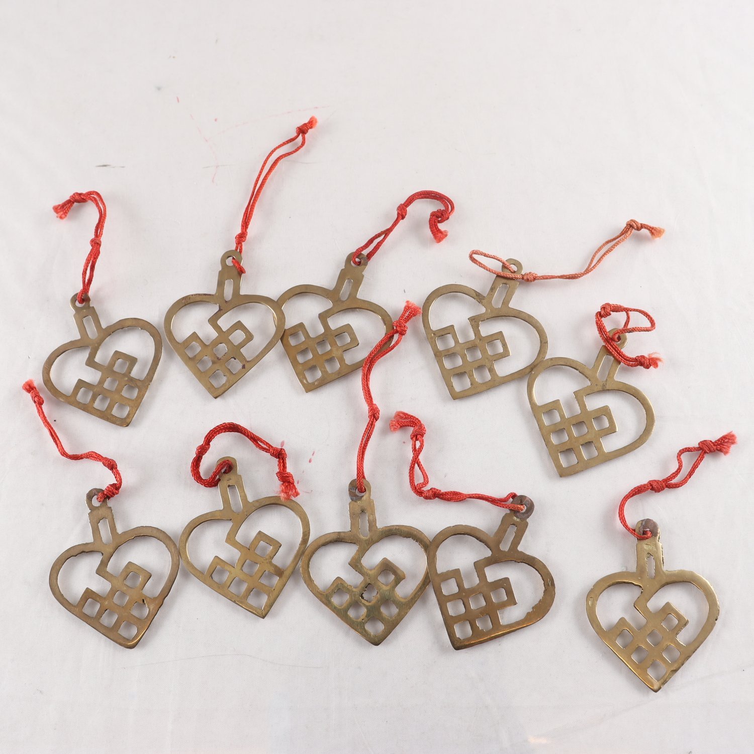 Hängen, mässing, Firma Svenskt Tenn, 10 st