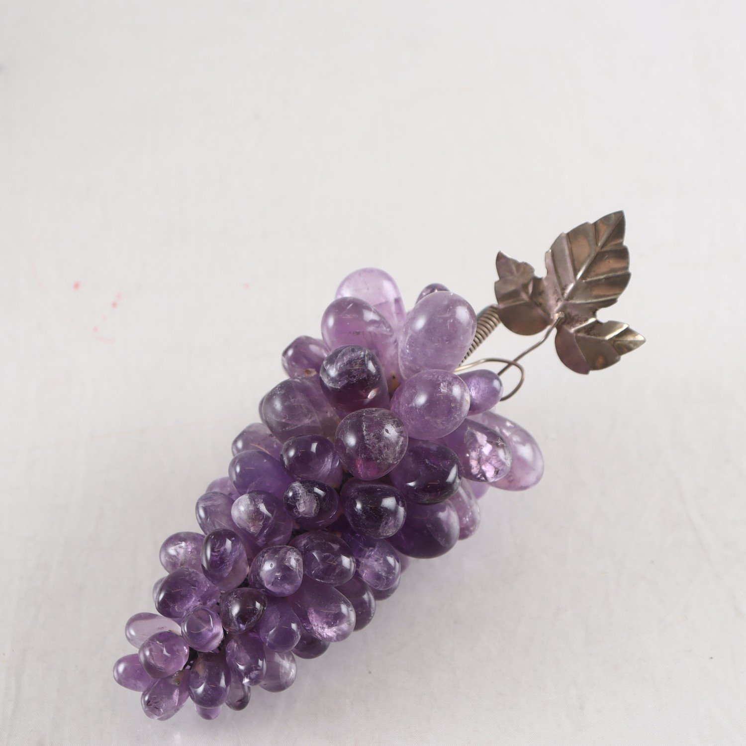 Bordsdekoration, vindruvsklasar, ametister