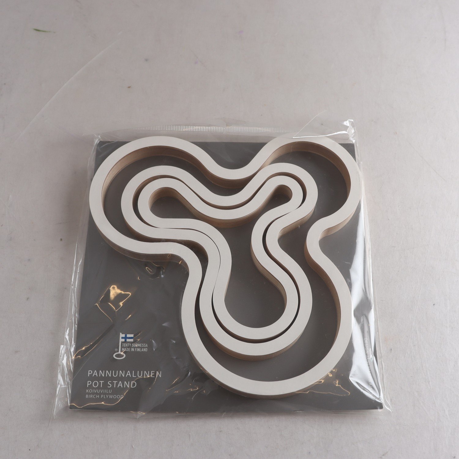 Grytunderlägg, trä, Majamoo, Finland