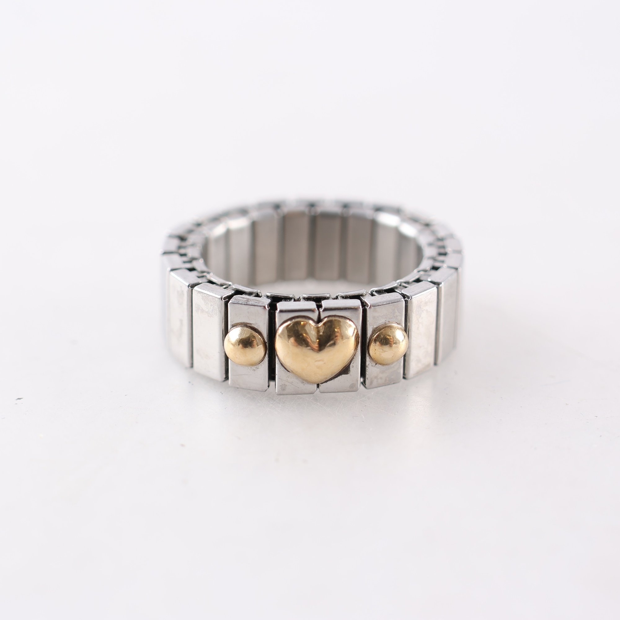 Ring, detaljer i guld 18K, stål, hjärta