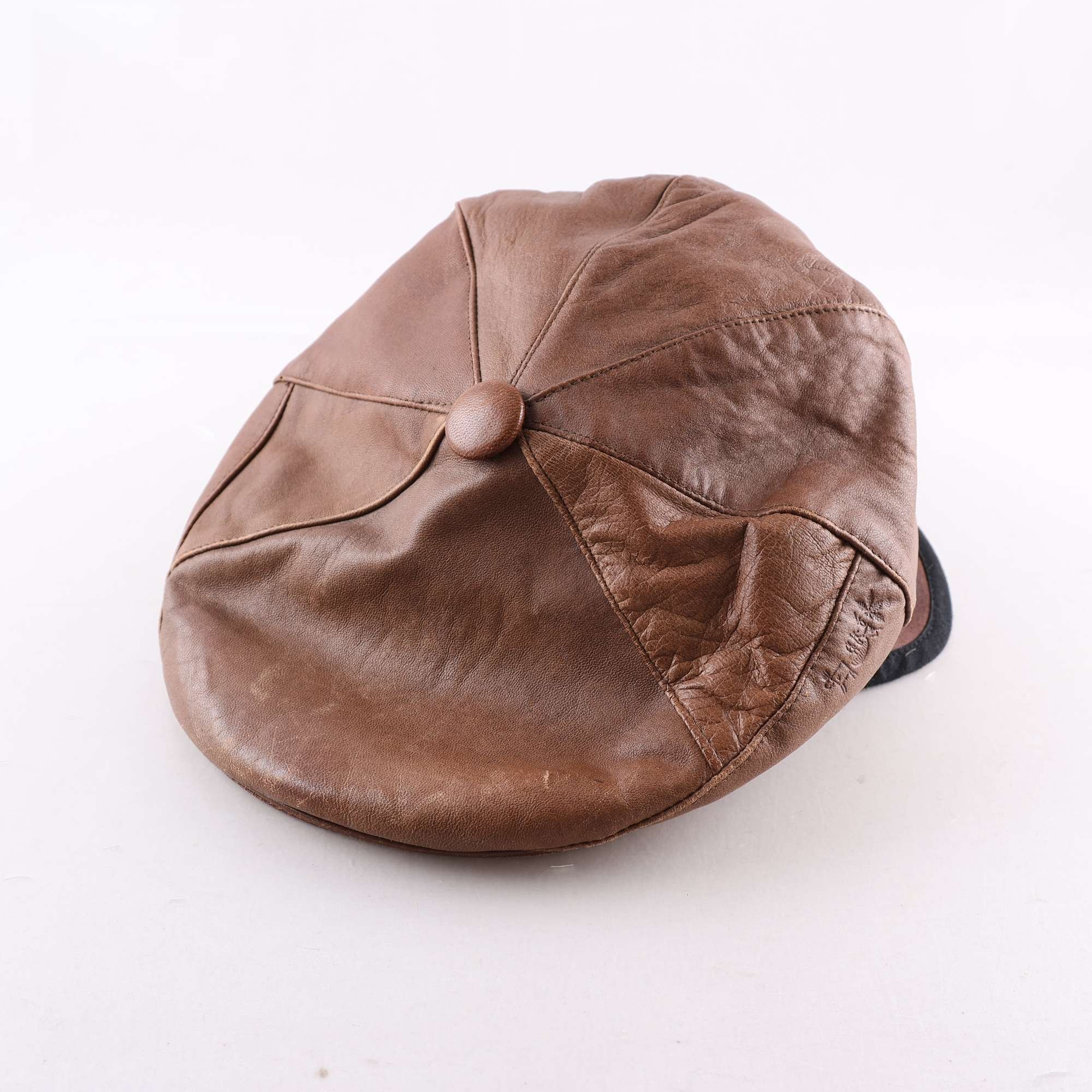 Keps, Salon, keps med öronlappar, brun, skinn, stl. 59.
