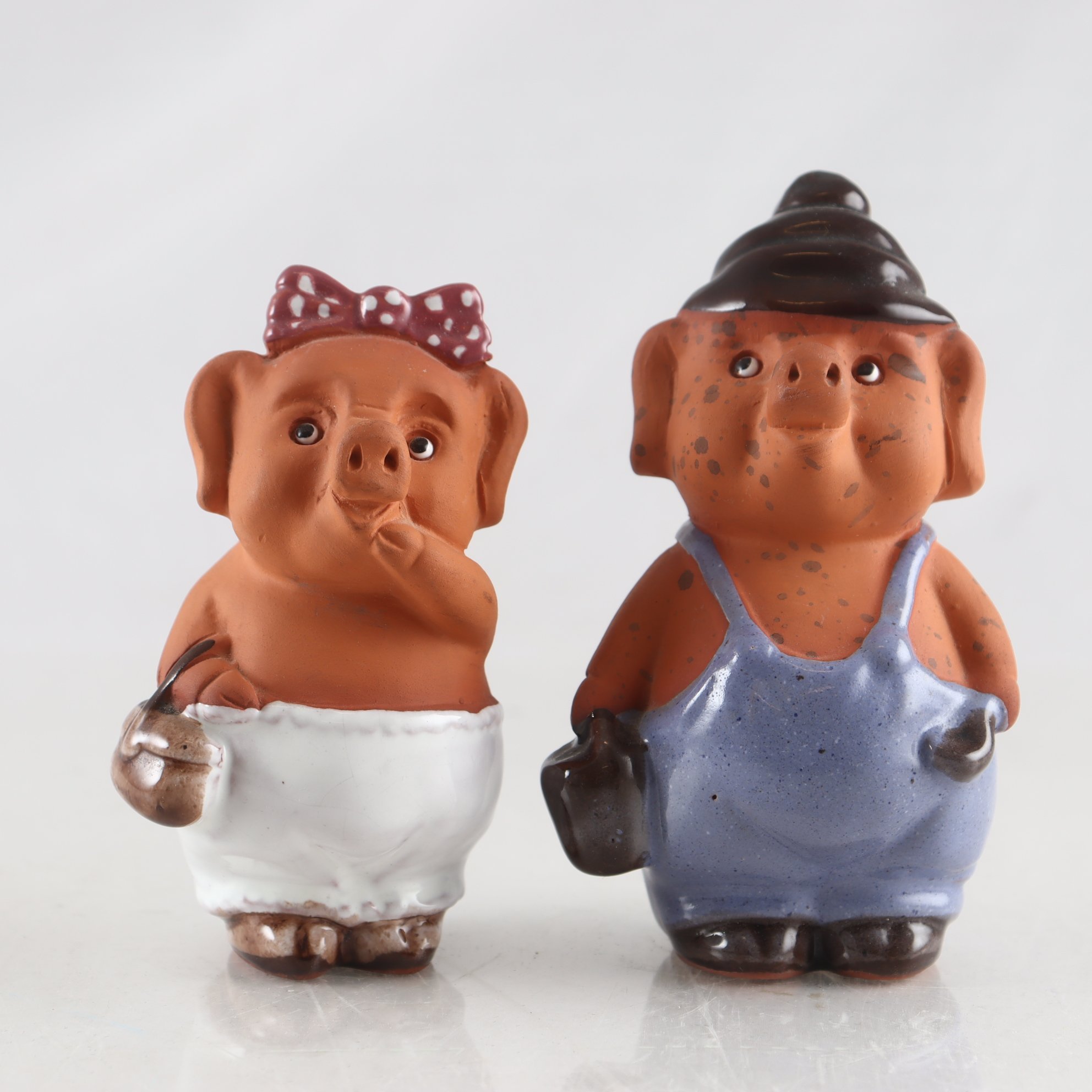 Figuriner, keramik, grisar, Rolf Berg, 2 st