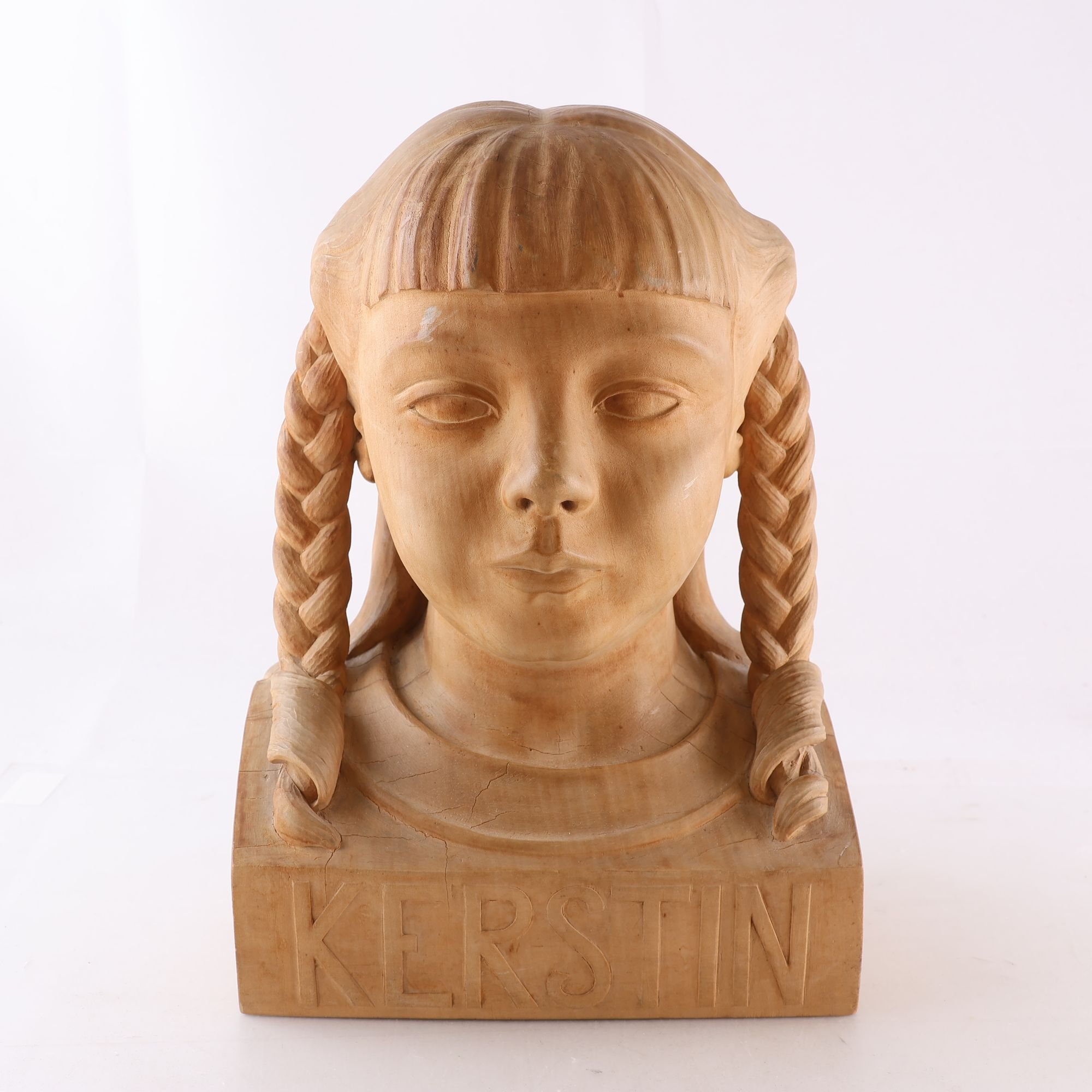 Skulptur, byst, trä, monogramsignerad, D.L.J, 1918. Samfraktas ej.