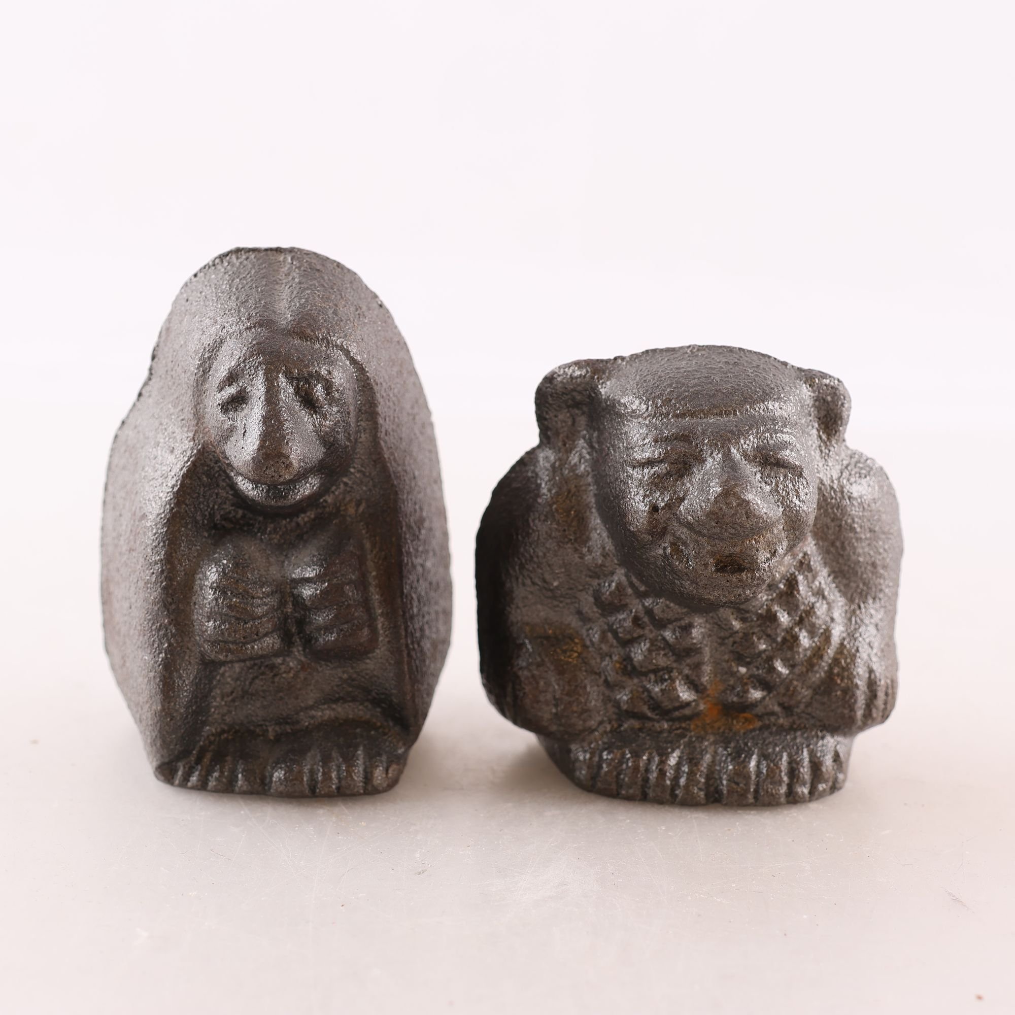 Figuriner, troll, gjutjärn, sign. K.G, efter John Bauer, 2 st.