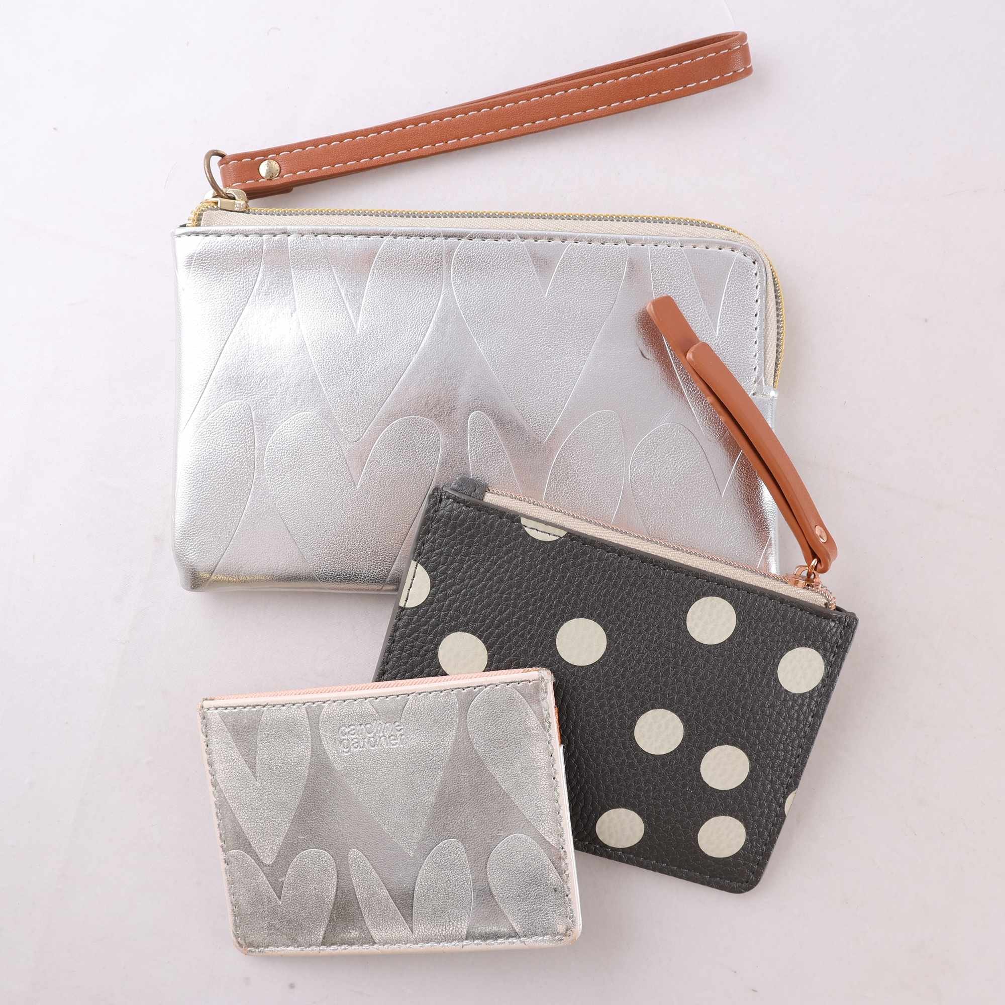 Plånboksset, Caroline gardner