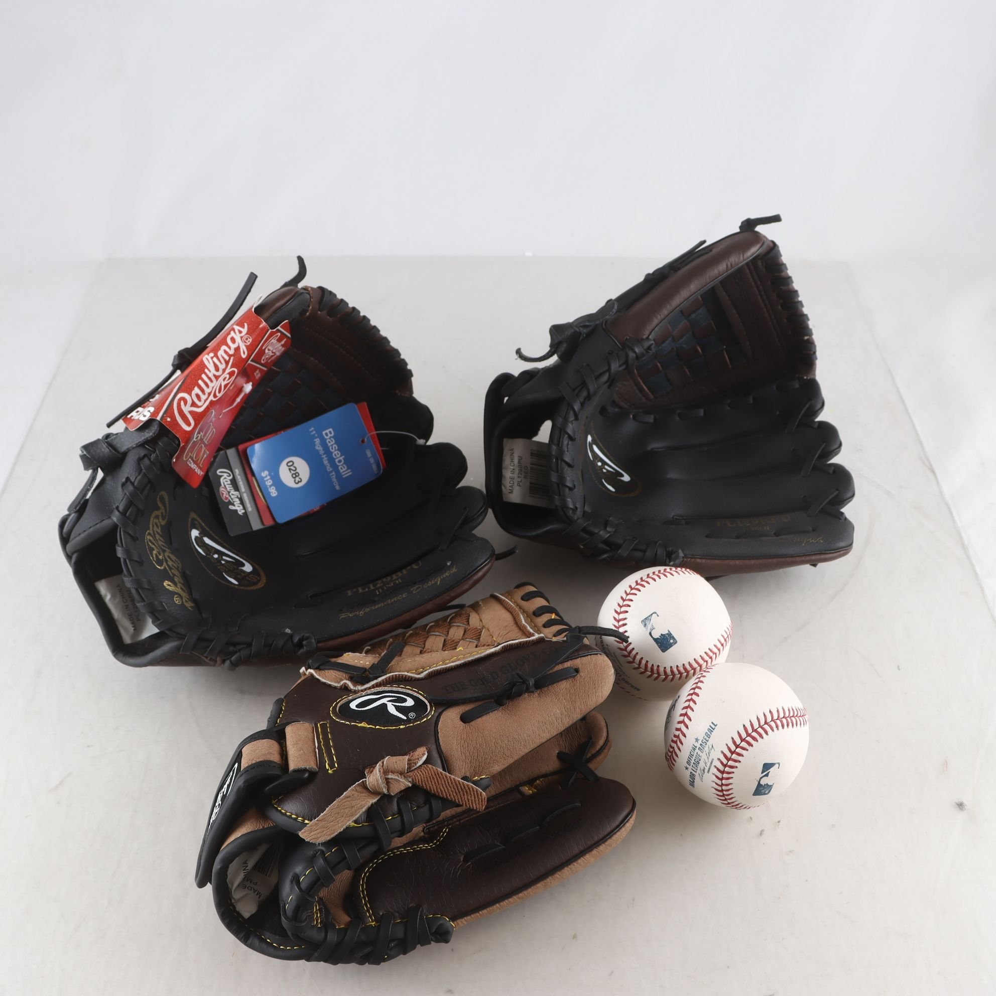 Baseballhandskar, Rawlings, med bollar.