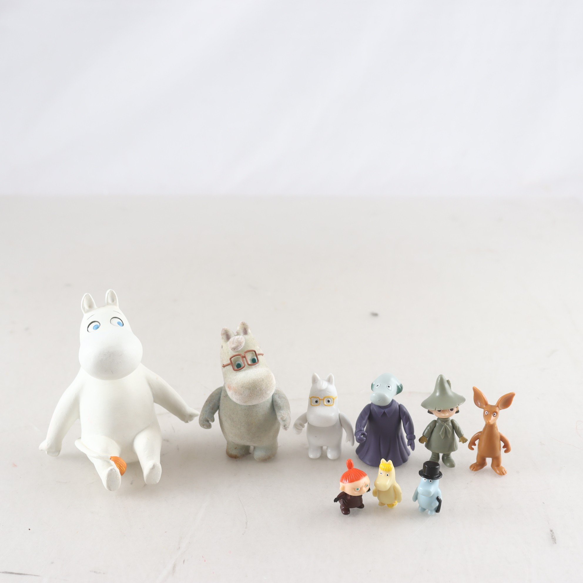 Muminfigurer, 9 st.