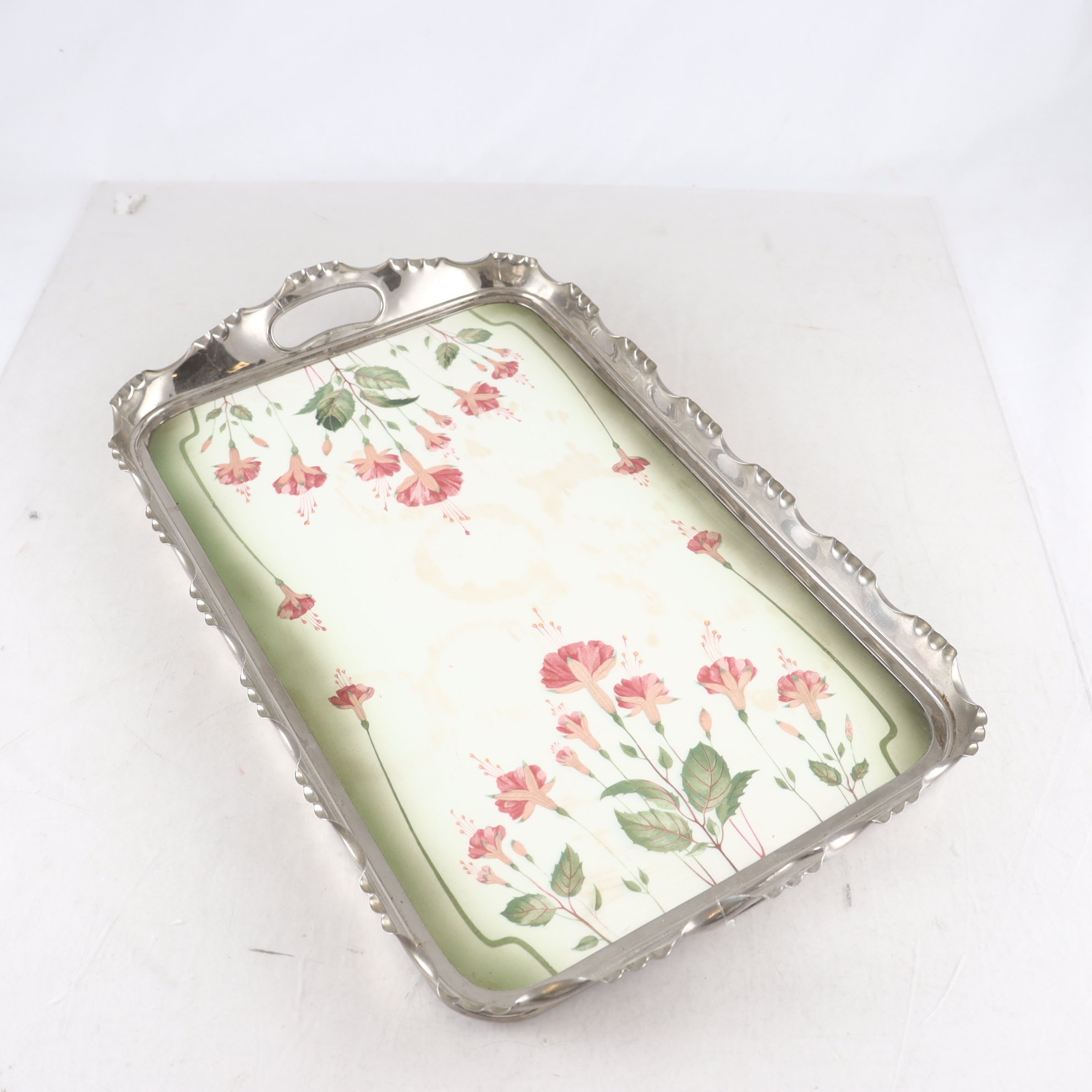 Bricka, porslin och rostfritt stål, märkt Geschützt. Samfraktas ej.