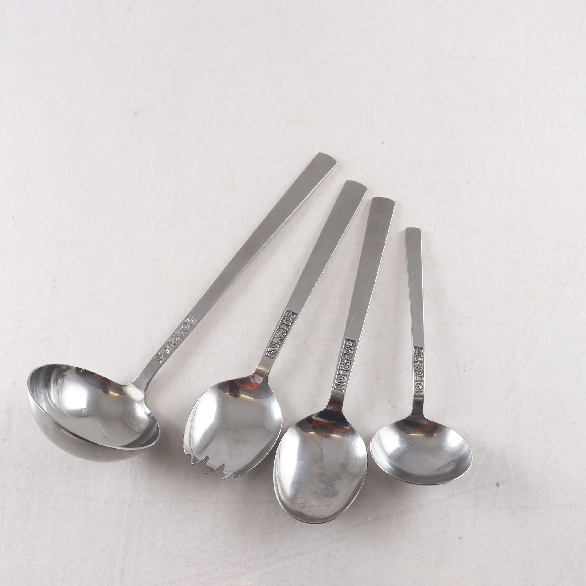 Bestick, Åhlens, ”Rosen”, rostfritt, 4 del serveringsbestick.