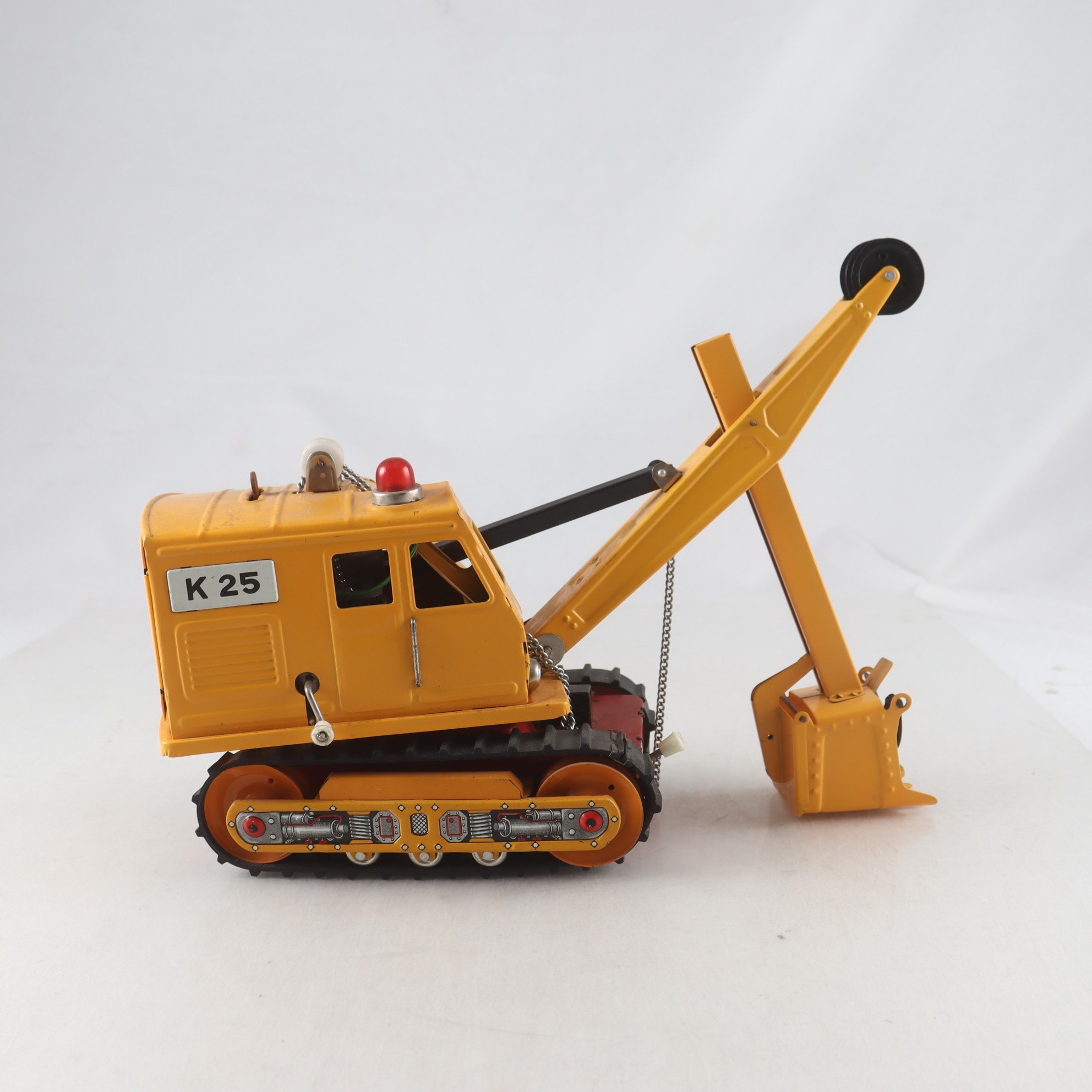 Fordon, Grävmaskin i plåt, japan, batteri drift, retro. Samfraktas ej