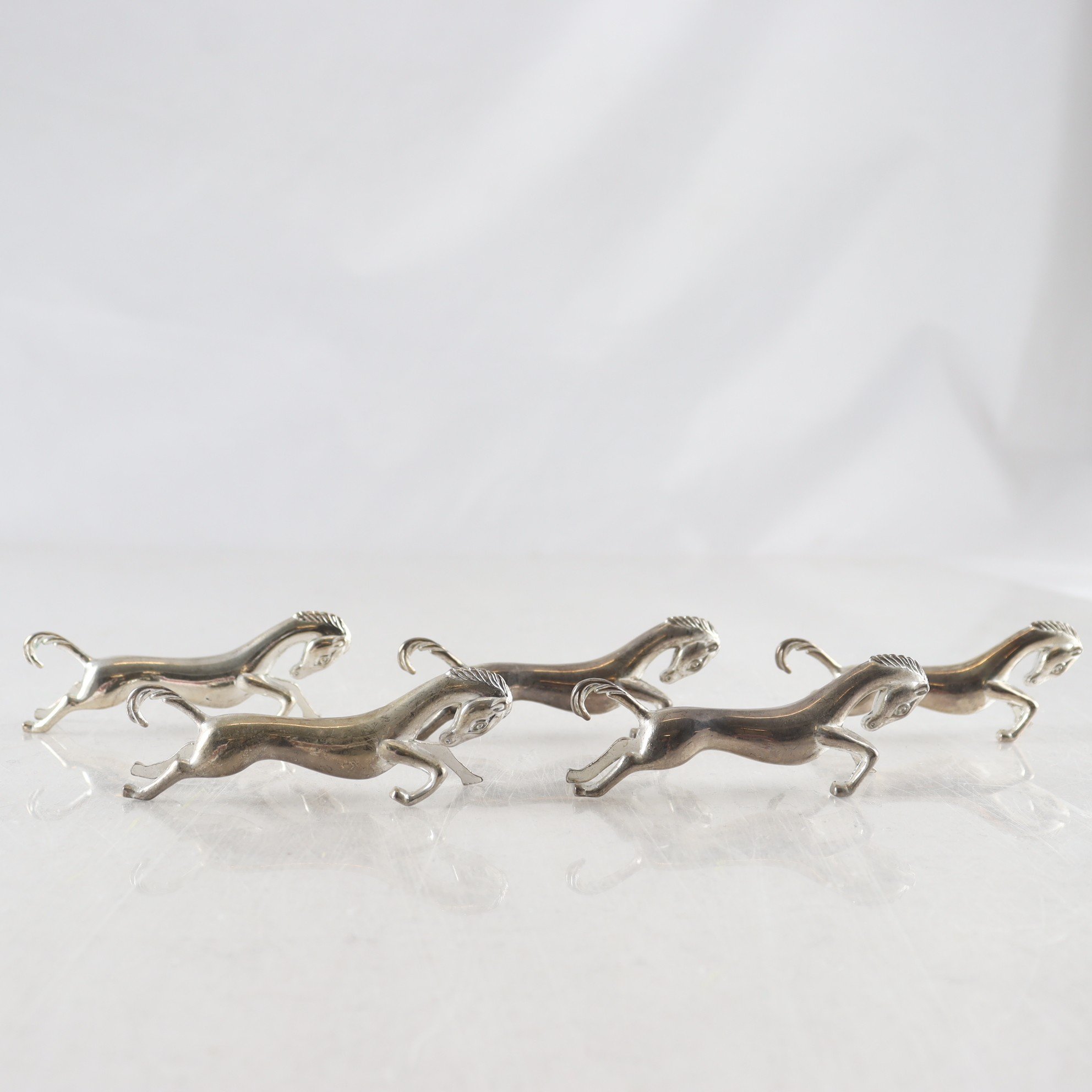 Knivlägg, smörtaxar, hästar. 5 st.