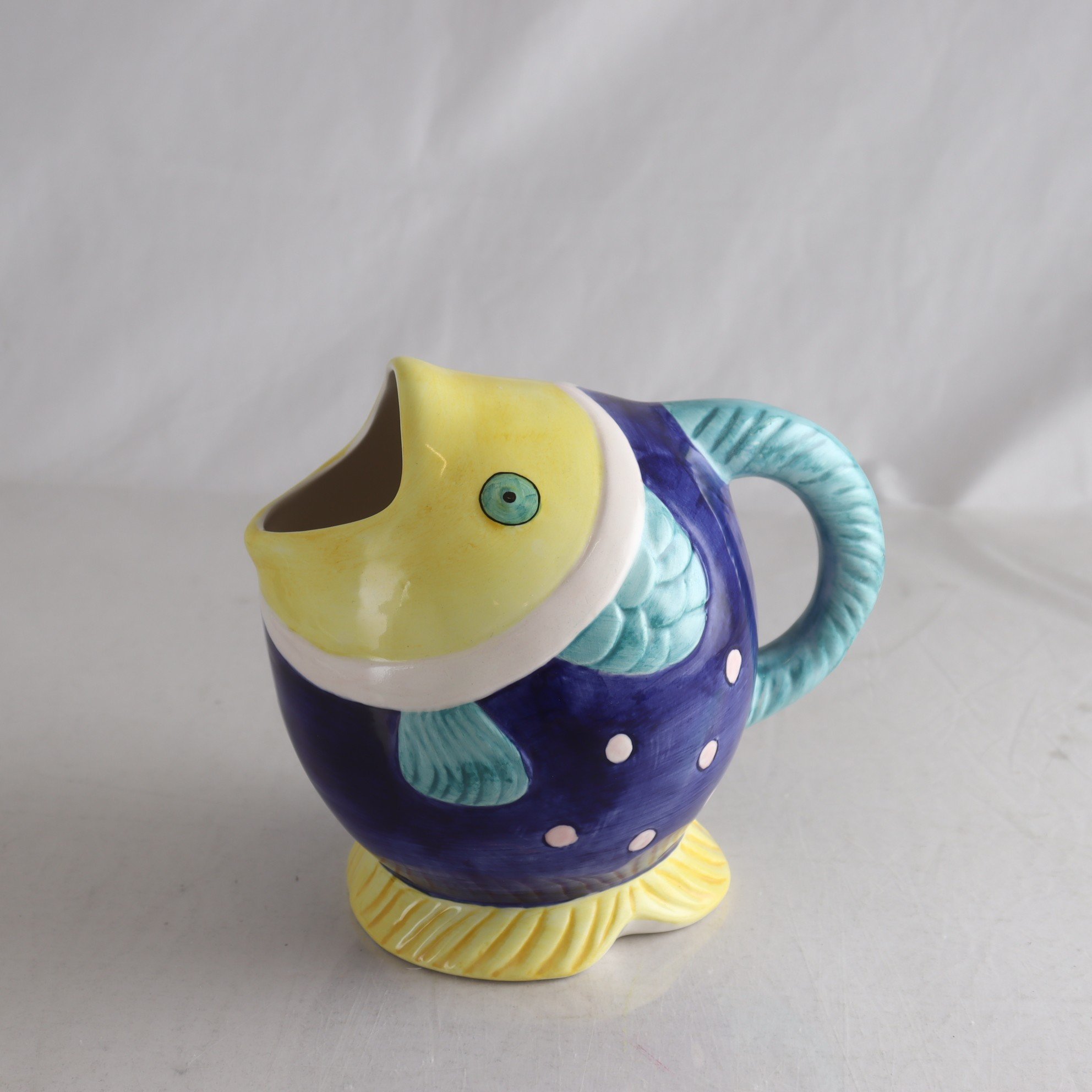 Kanna, Fisk, Porslin.