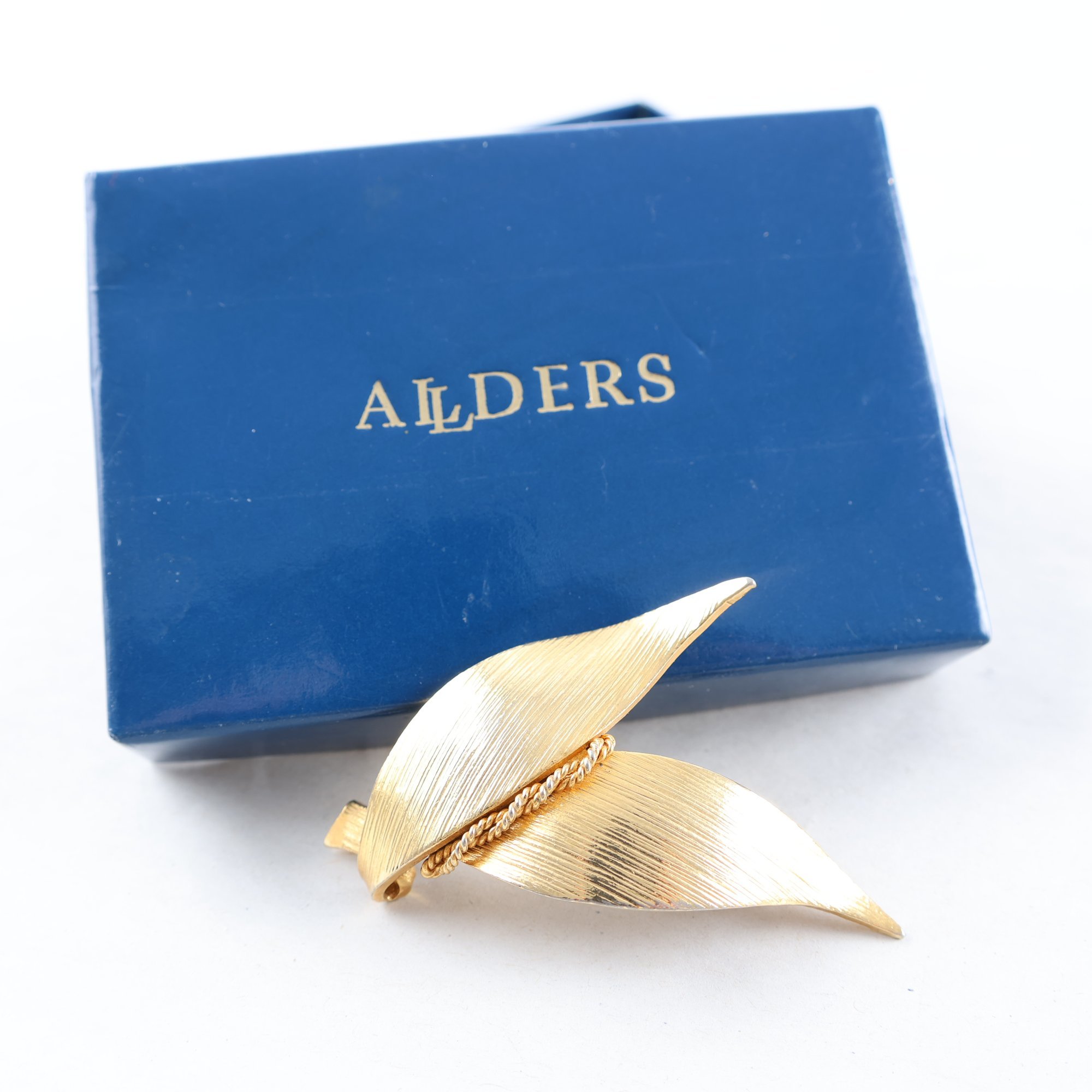 Brosch, guldfärgad, Allders