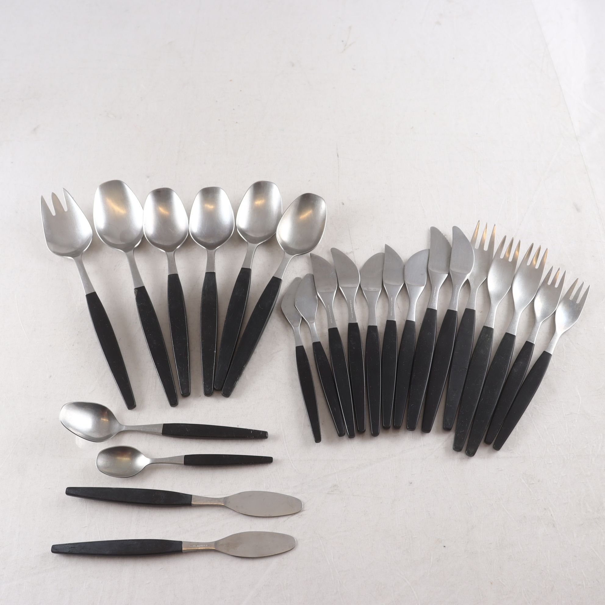 Bestick, Gense, ”Focus de Luxe”, Folke Arström, 1955, rostfritt stål, 24 del.