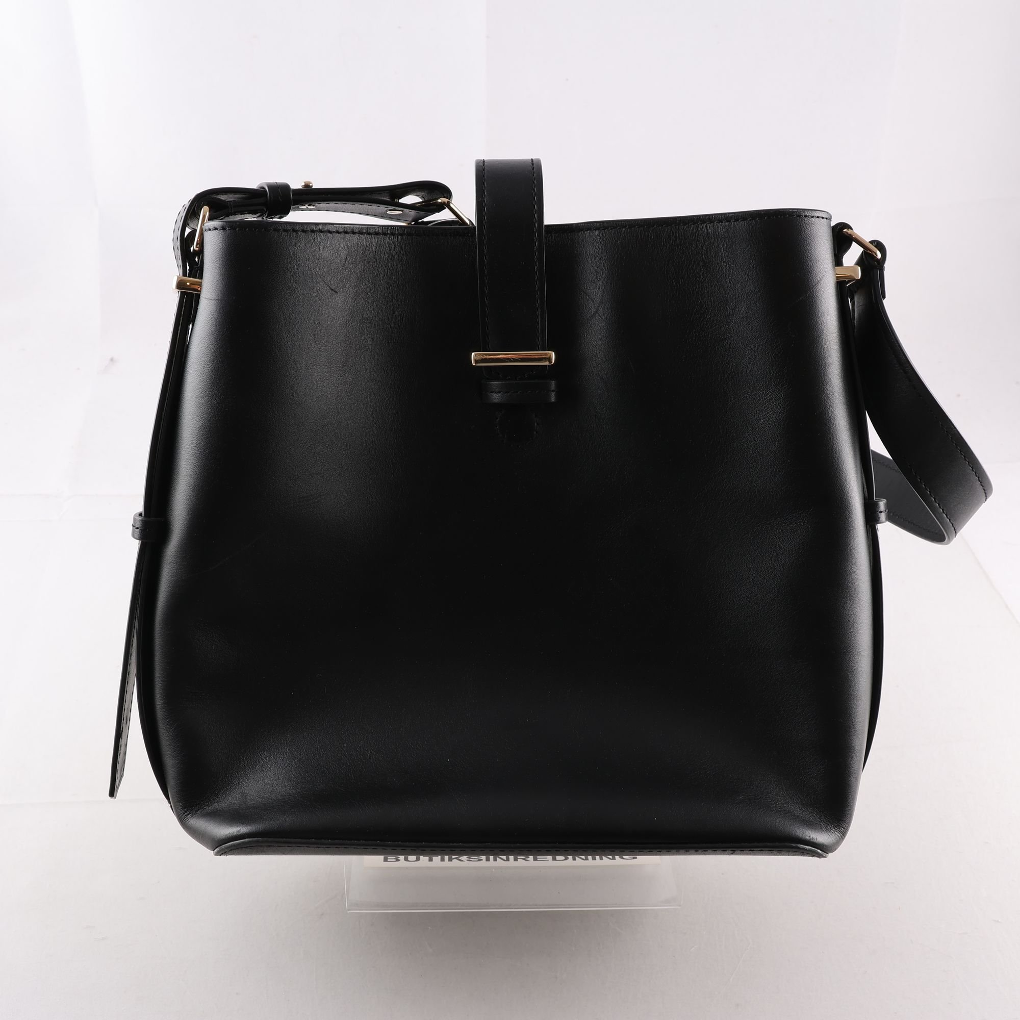 Väska, & Other Stories, Läder