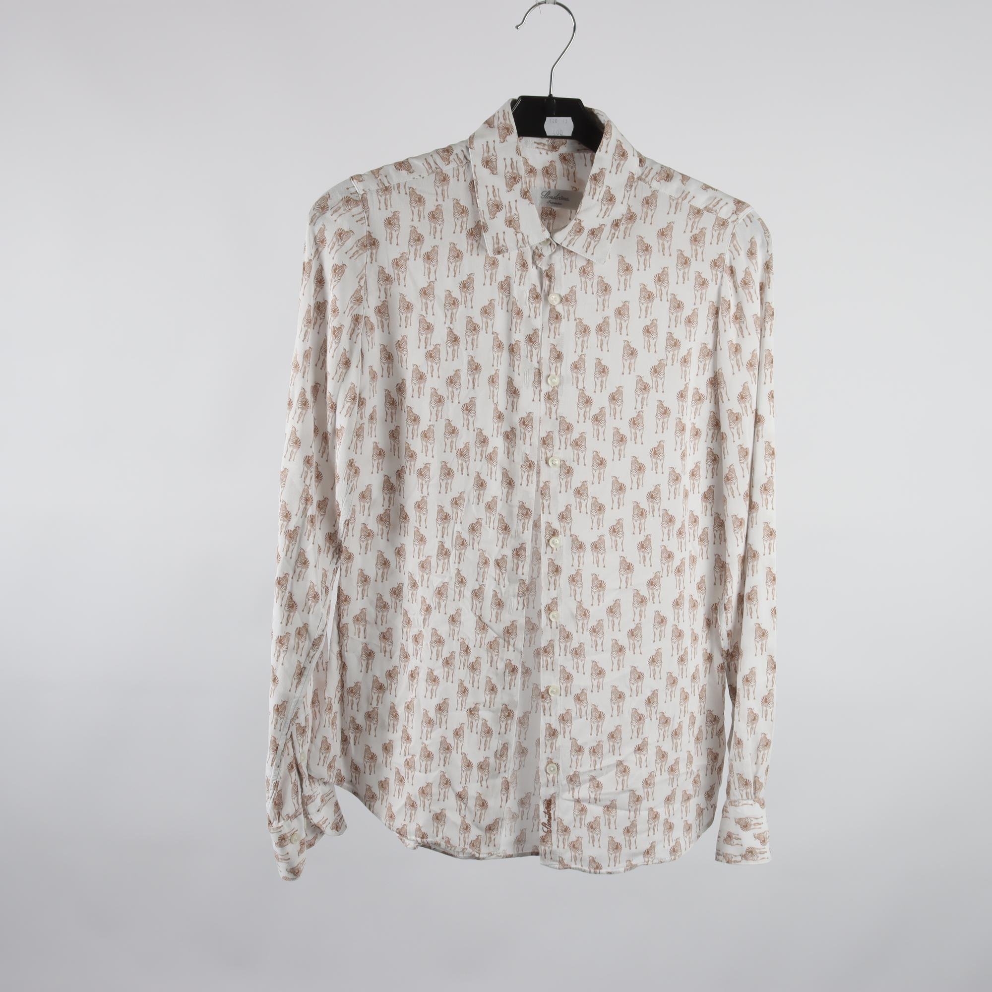 Blus, Stenströms, vit, brun, zebror, stl. 34.