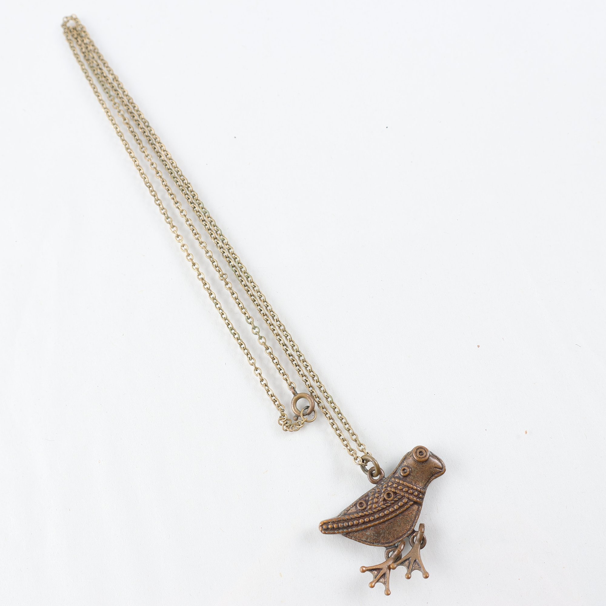 Halsband, Kalevala Koru, ”Hattulan lintu”, brons.