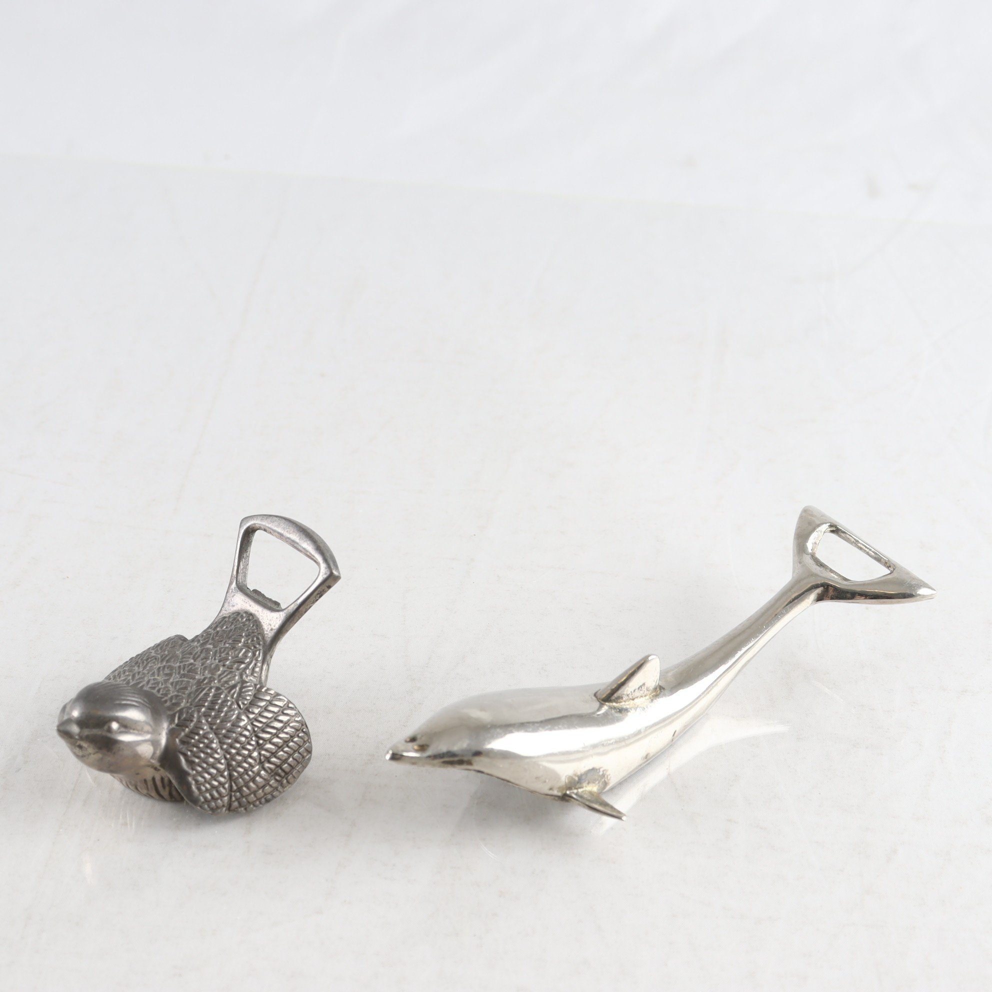 Kapsylöppnare, metall, Fågel & delfin.