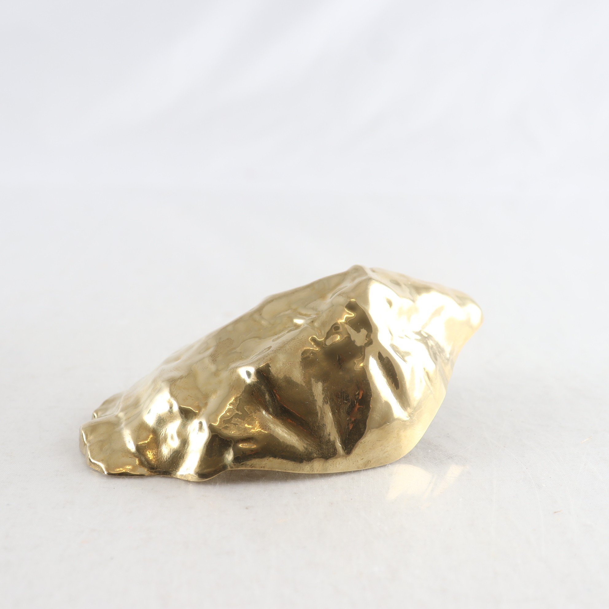 Flasköppnare, Skultuna, ”Oyster”, Benjamin Kurpatow, mässing.