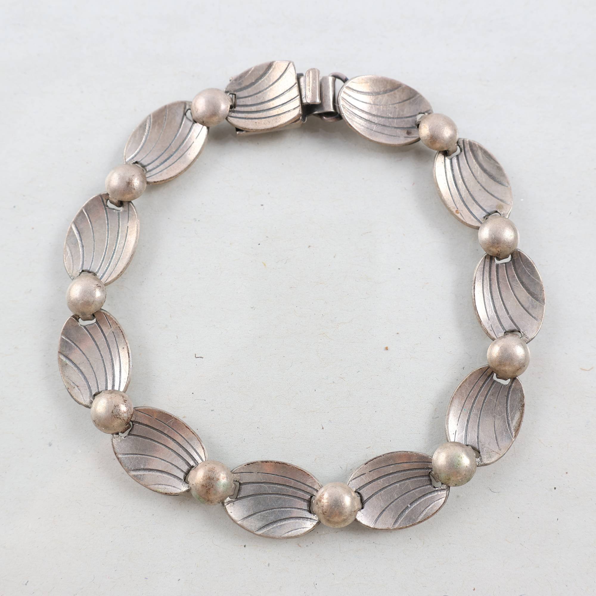 Silverarmband, Alton, kattfot, 1959.