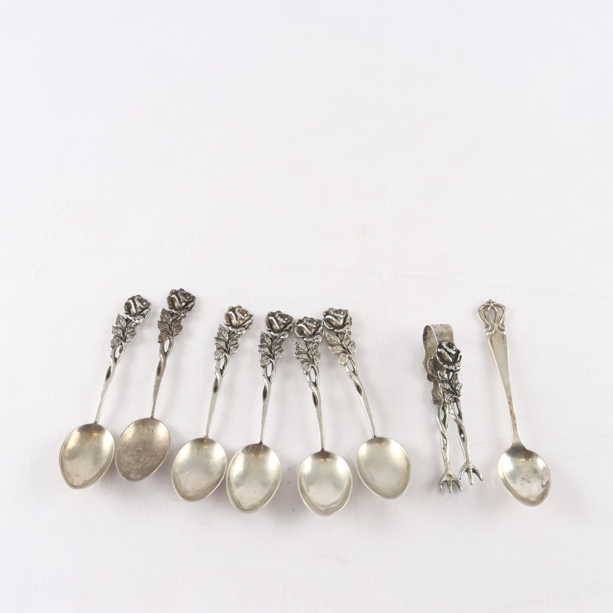 Sockertång, 7 st. kaffeskedar, silver, modell Rosen, JLH, Stockholm, 1957